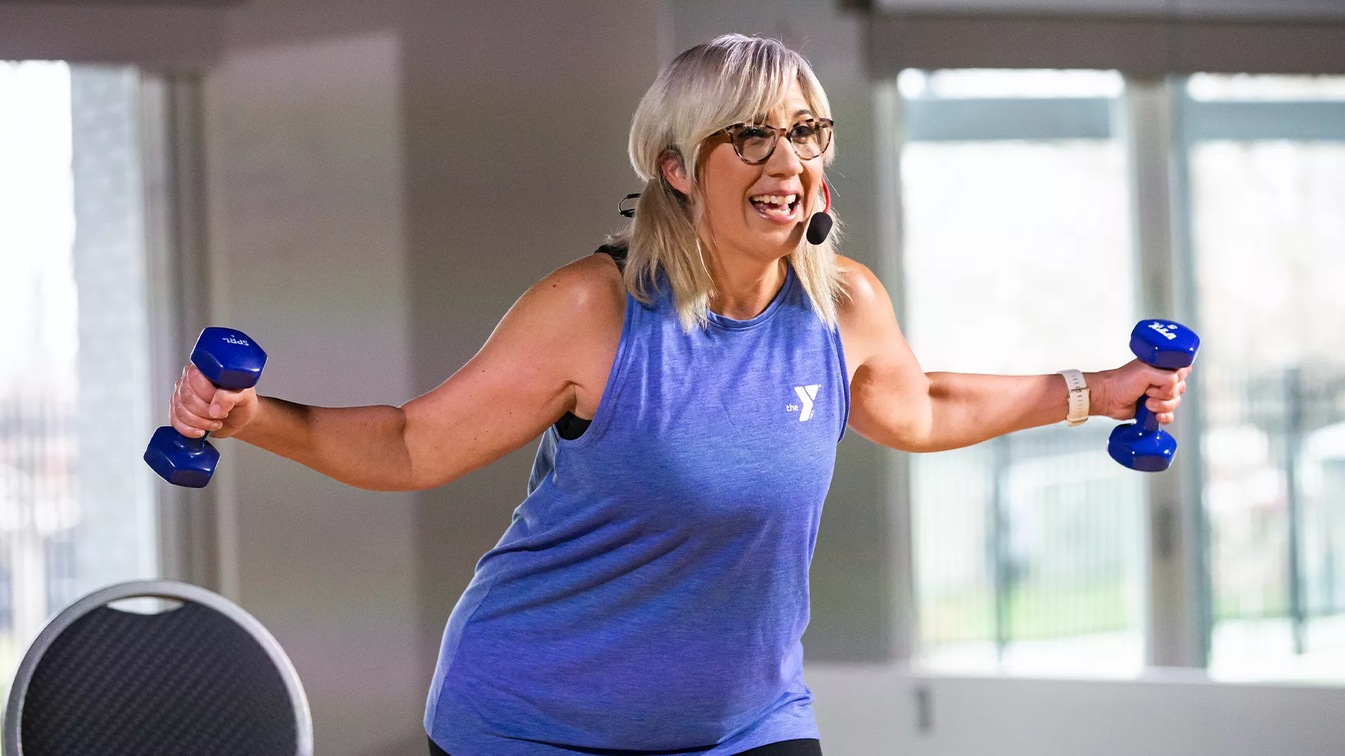 Woman working out with dumbbells