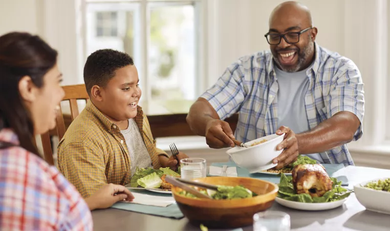 Image of a family enjoying a healthy meal together